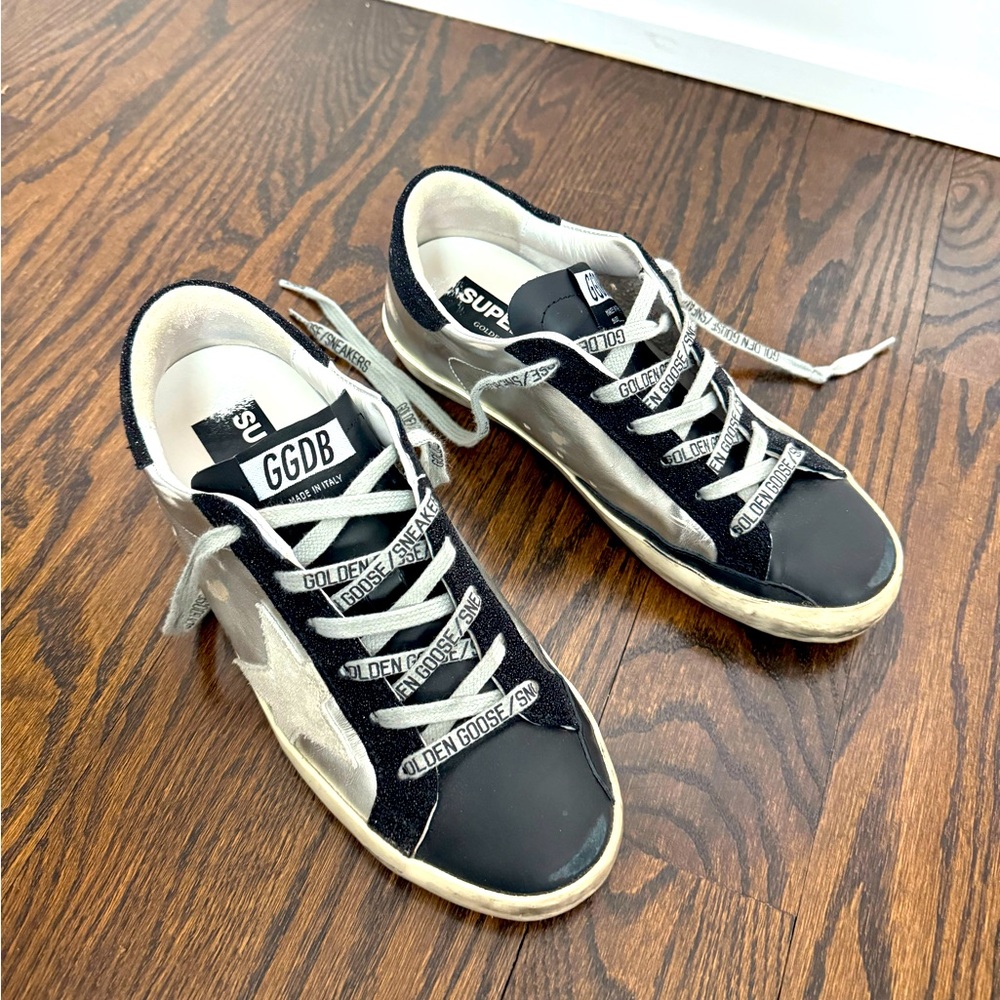 GOLDEN GOOSE
Superstar metallic distressed leather and suede sneakers